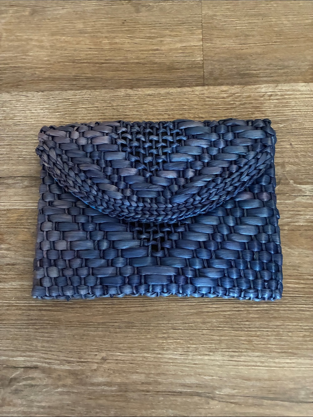 Blue straw clutch bag